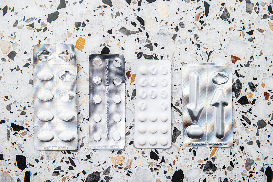 Various pills on mottled background