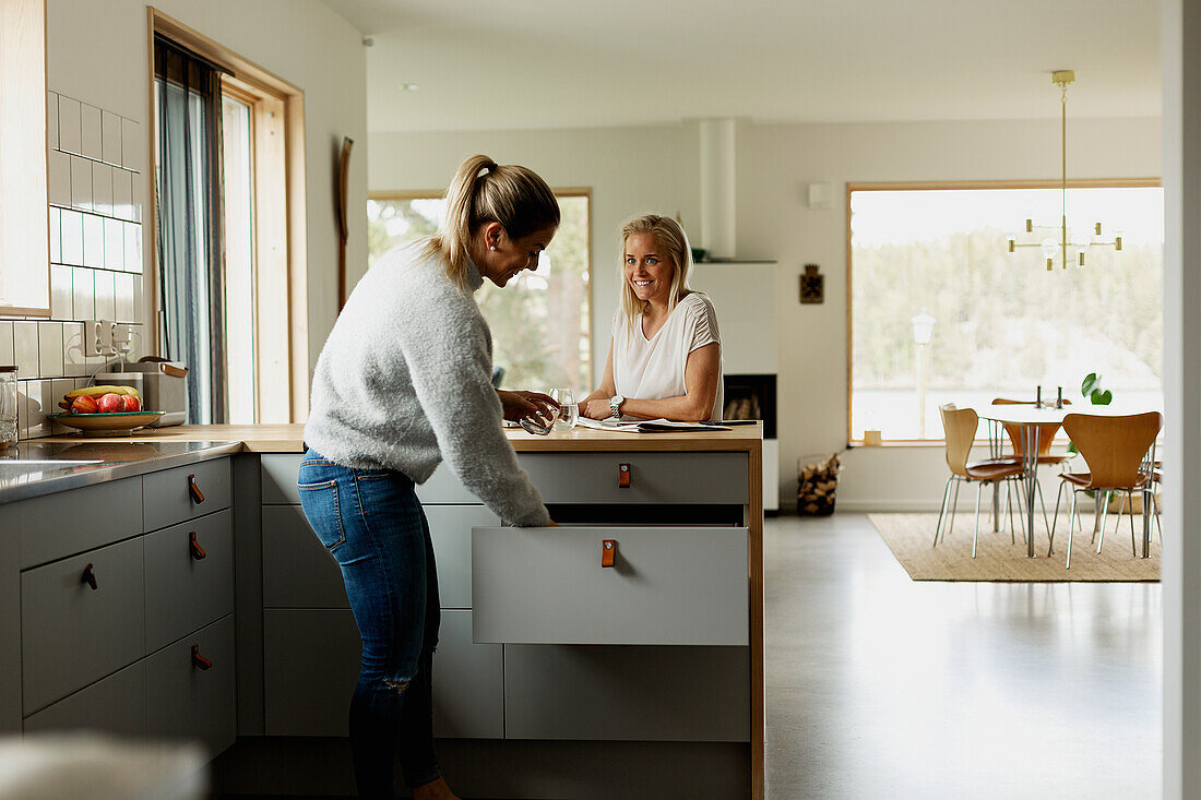 Two women at kitchen counter