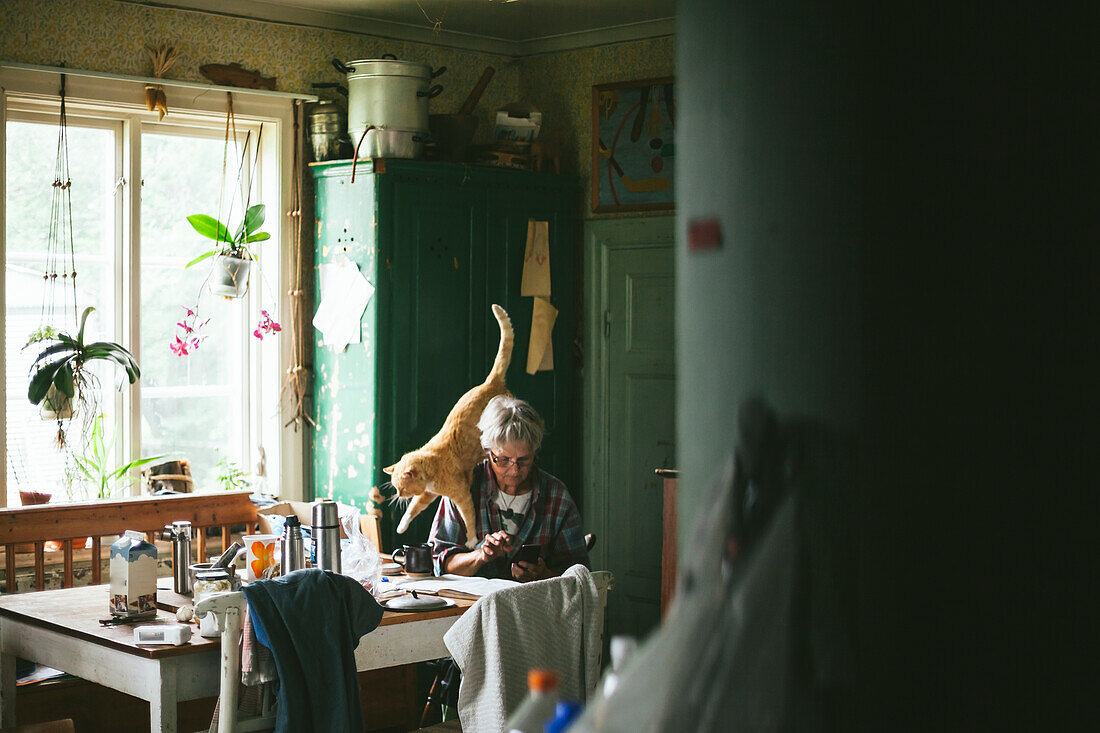 Senior woman sitting at table