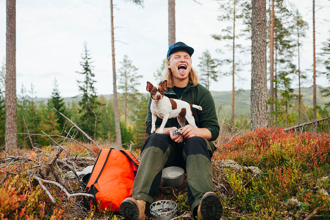 Smiling man with dog