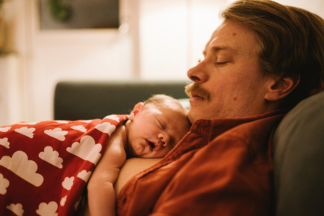 Father with newborn baby