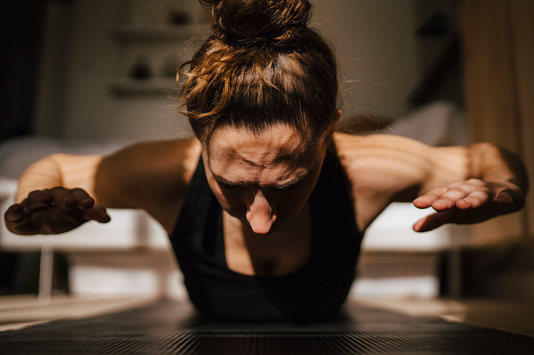 Woman exercising at home