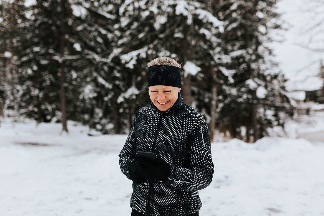 Smiling woman wearing sports clothes