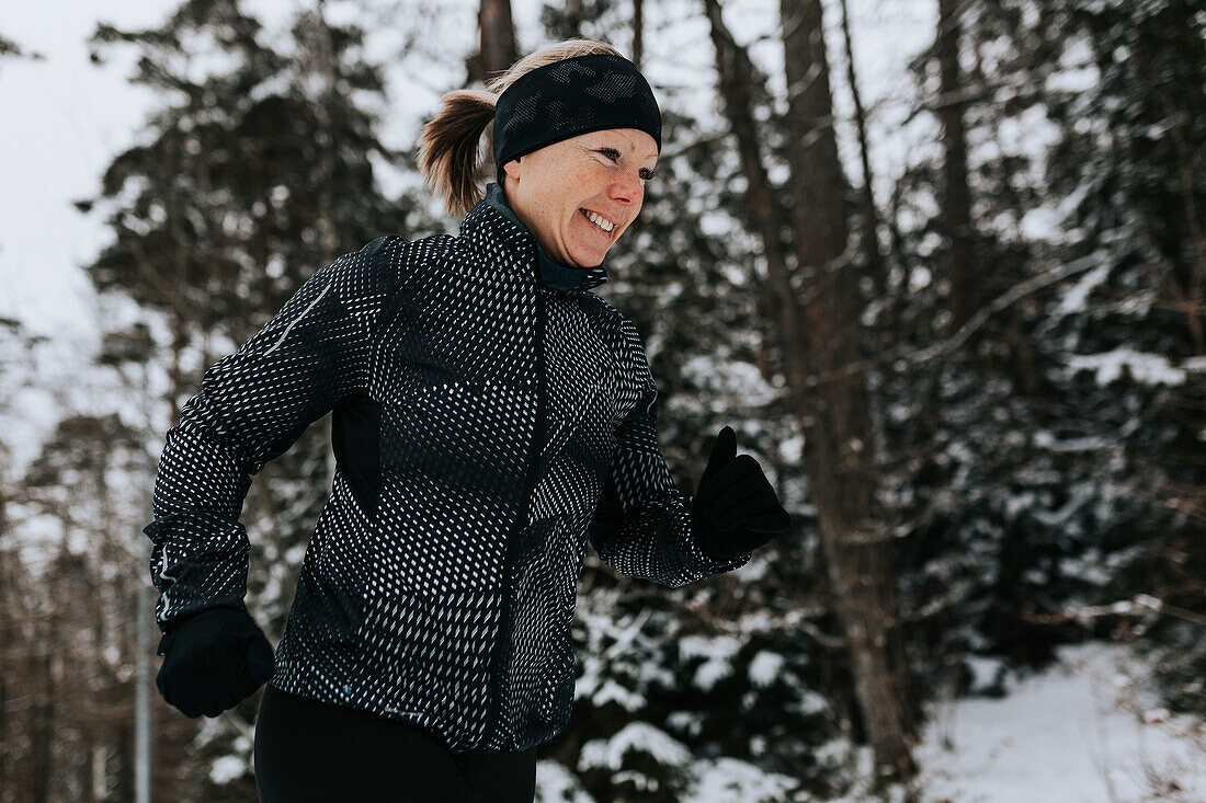 Woman jogging at winter