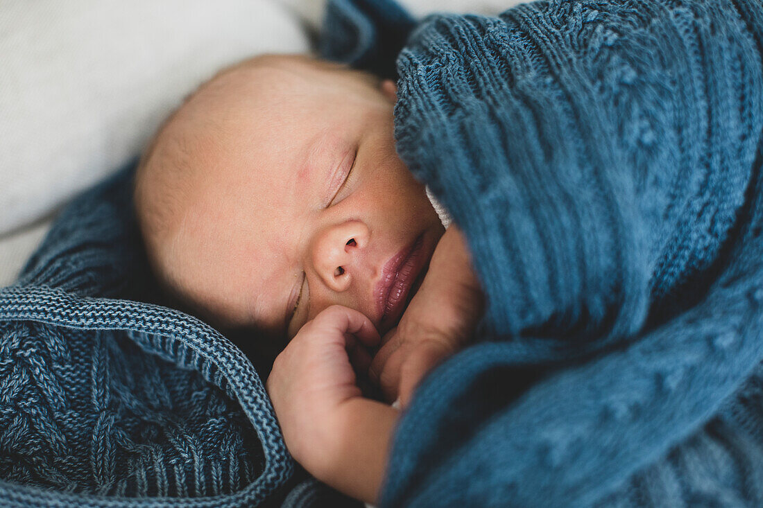 High angle view of baby sleeping