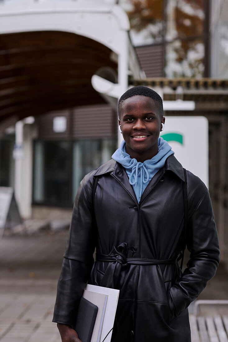 Young man looking at camera