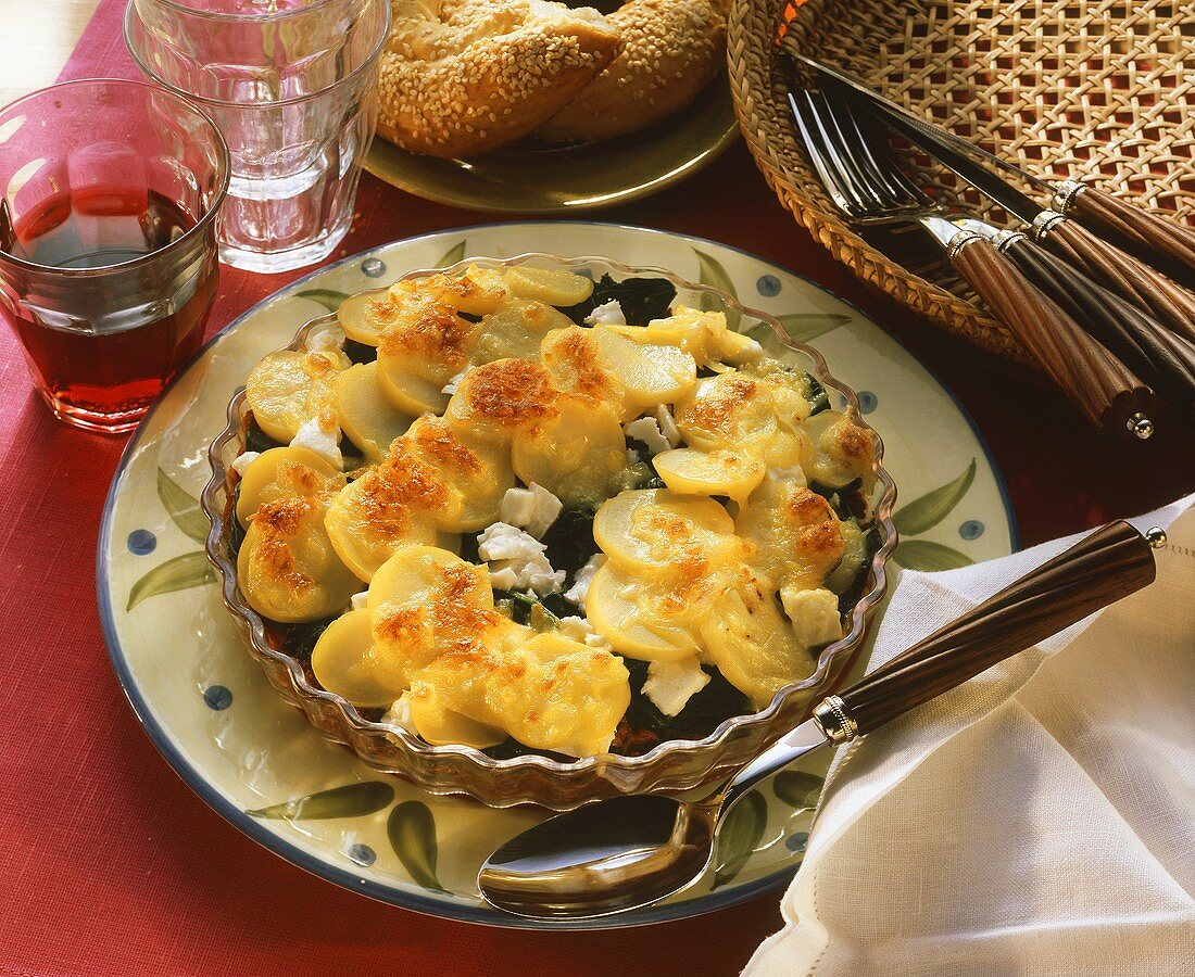 Spinach and potato gratin with sheep's cheese