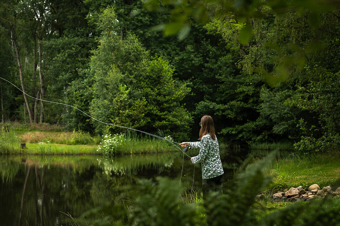 View of man fishing