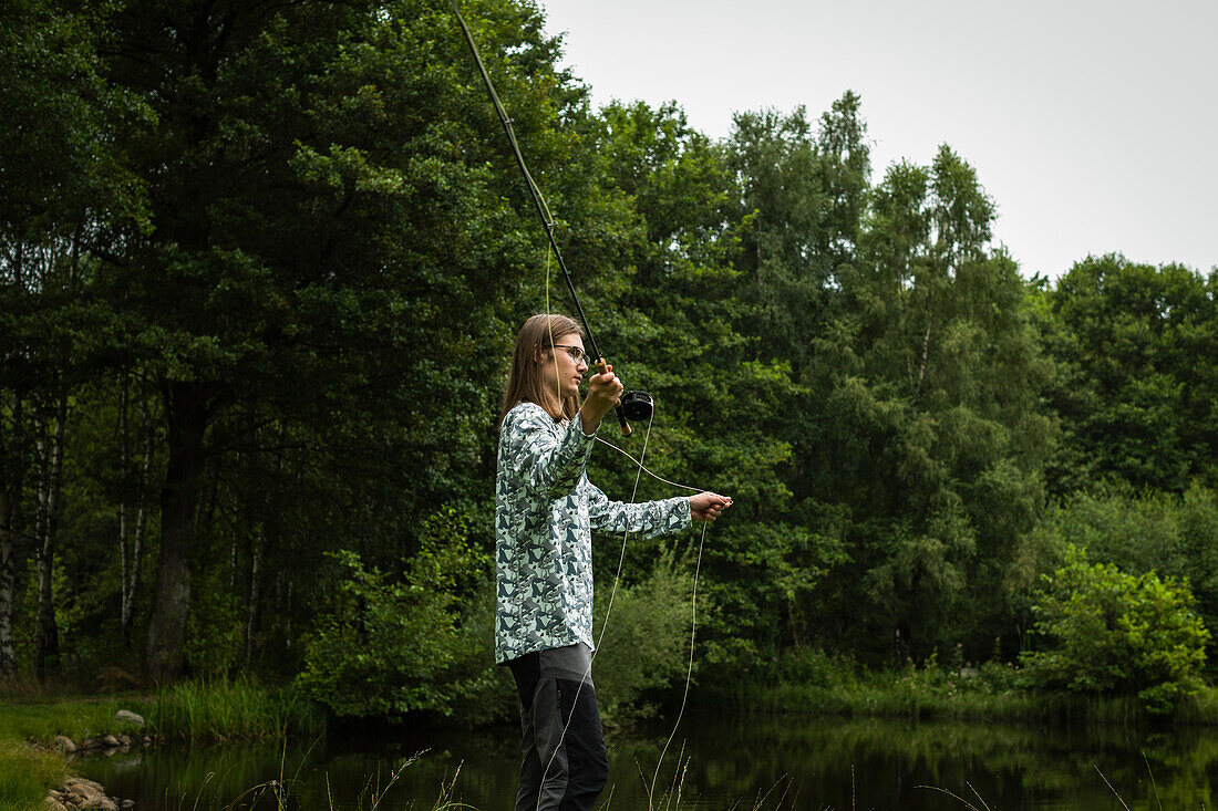 View of man fishing