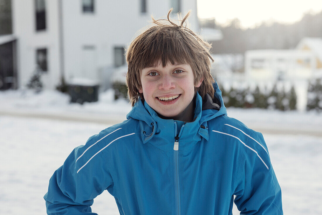 Smiling teenage boy at winter