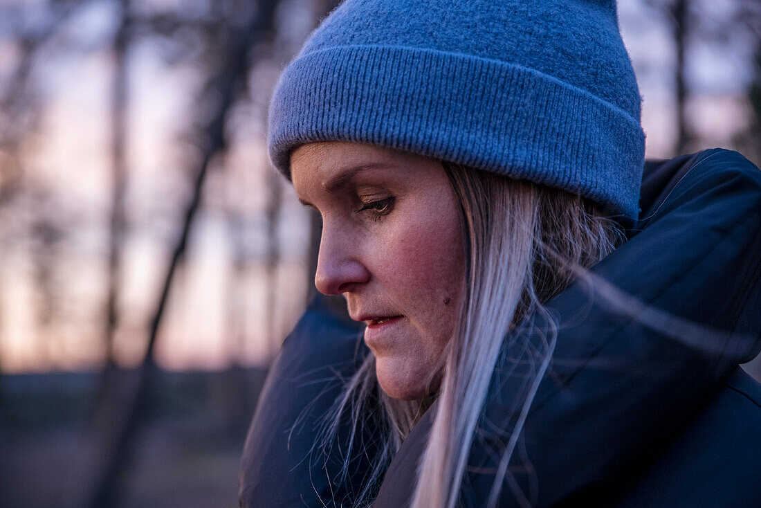 Woman contemplating outdoors