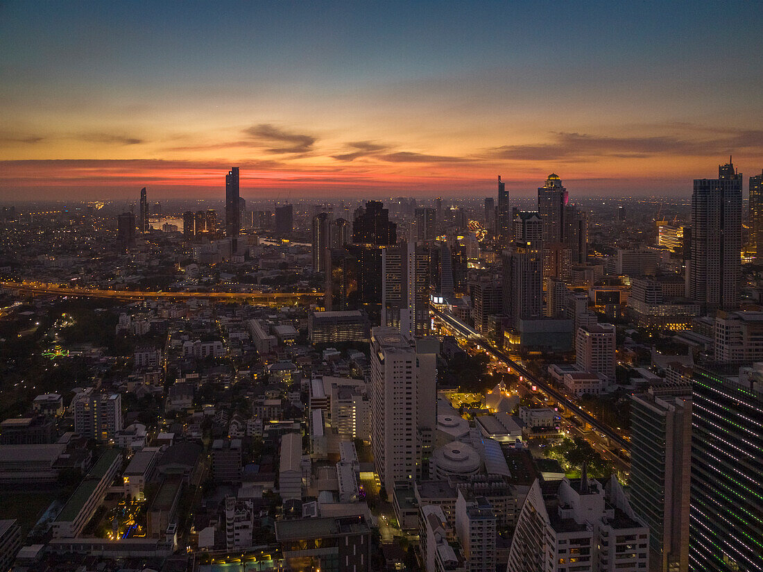 Modern cityscape of business district at sunset