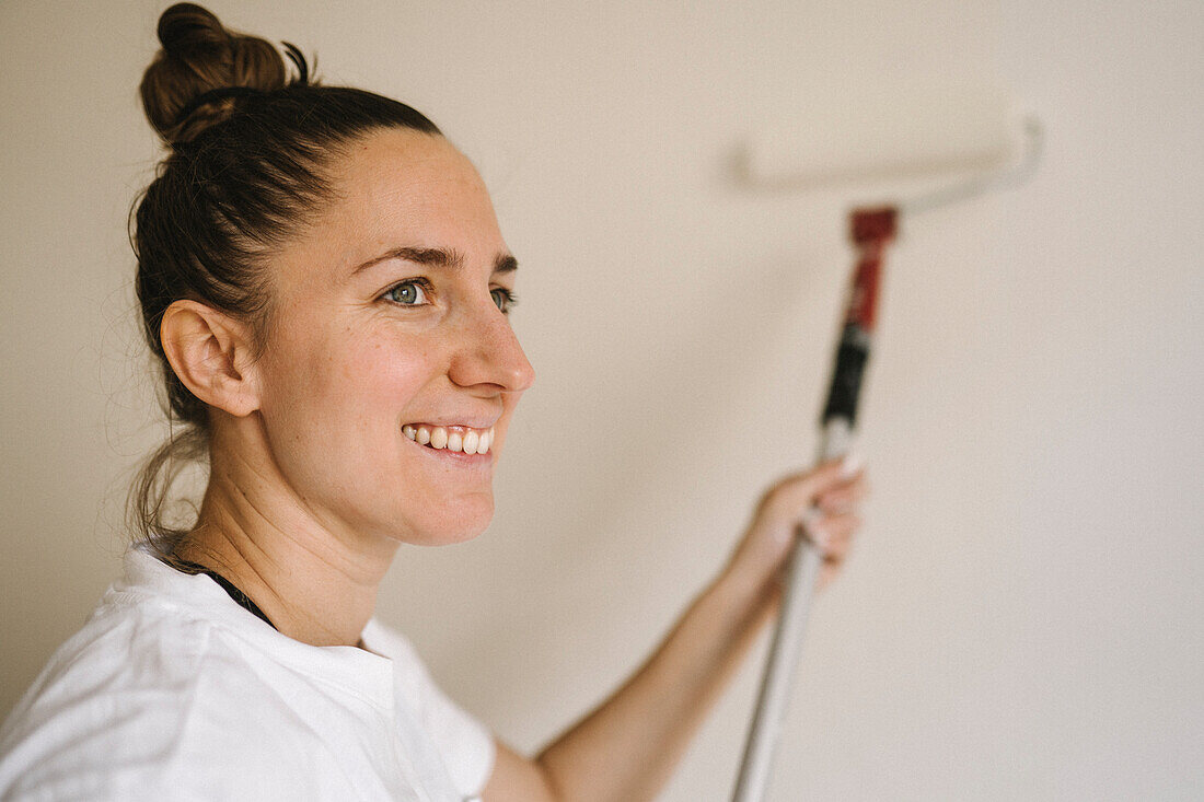 Woman painting room