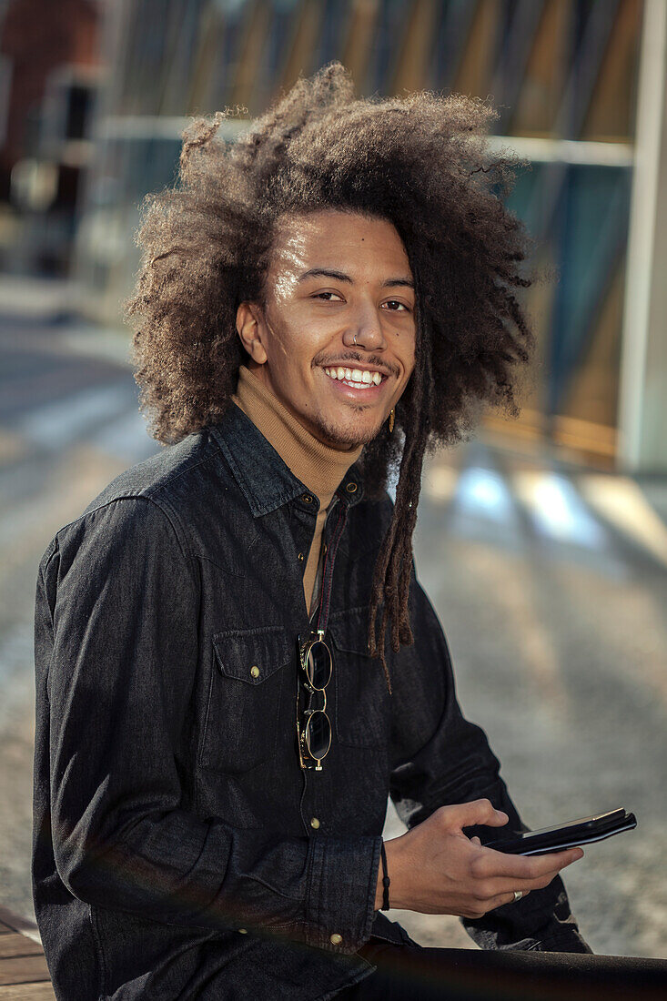 Young man looking at camera