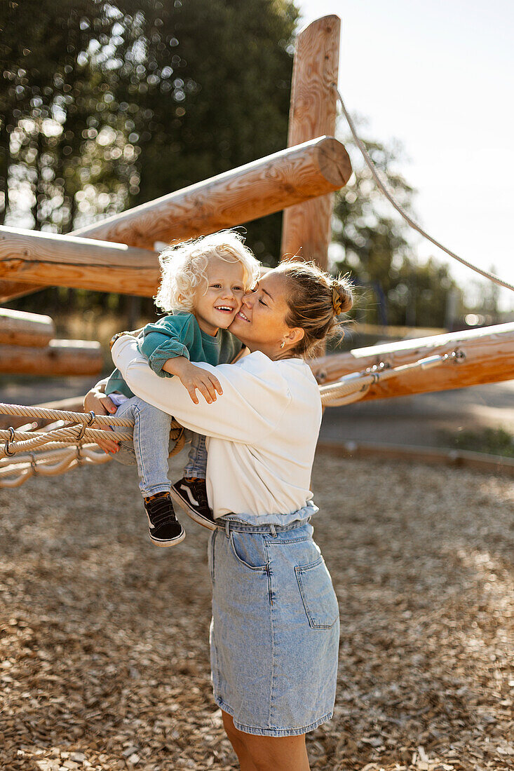 Mother with child on playground