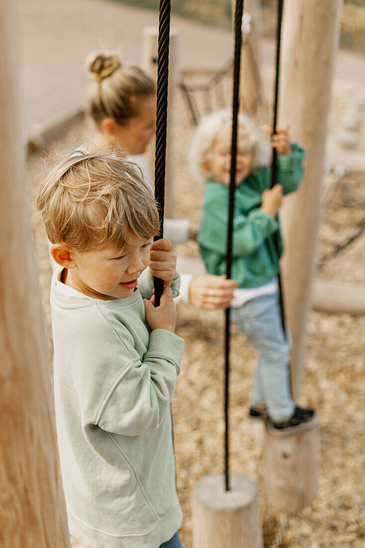 Boy playing at playground