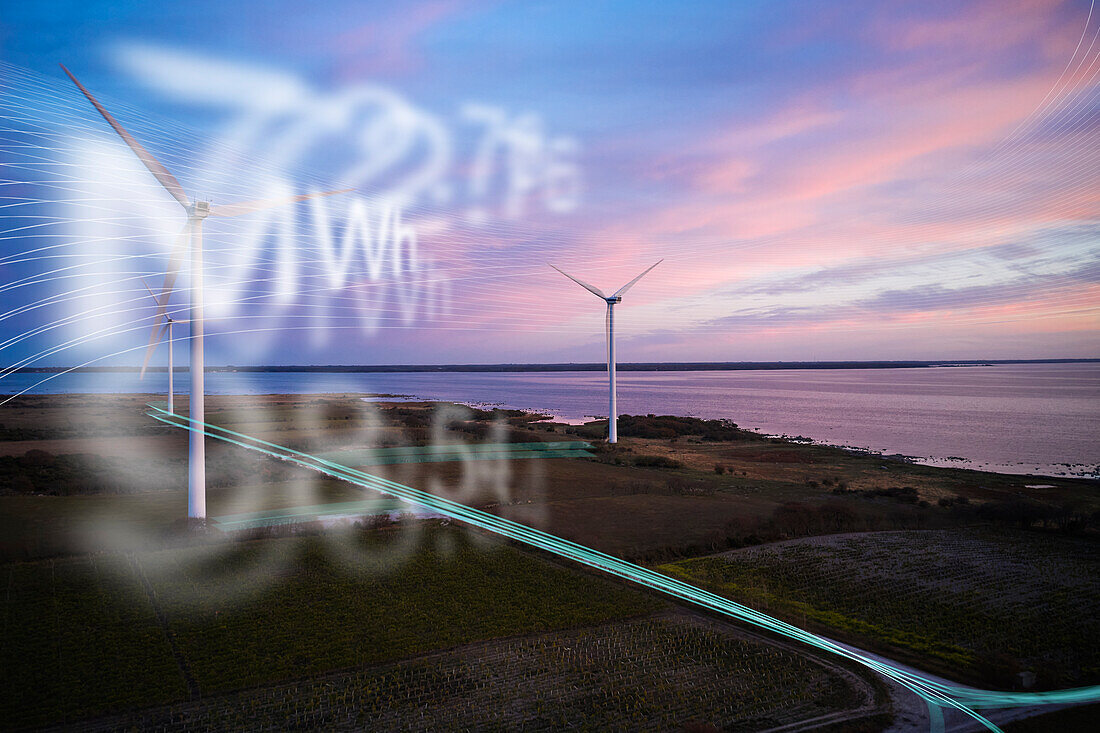 Aerial view of wind turbines at sea coast