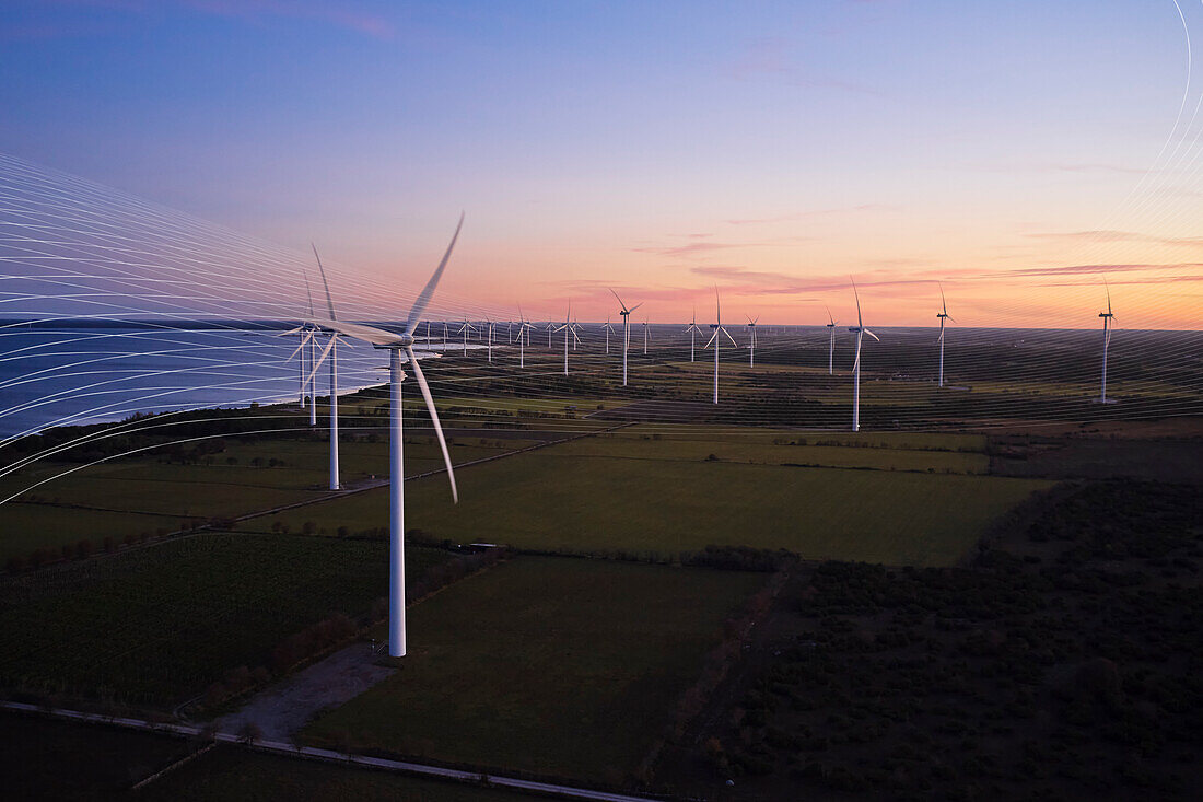 Aerial view of wind turbines at sea coast