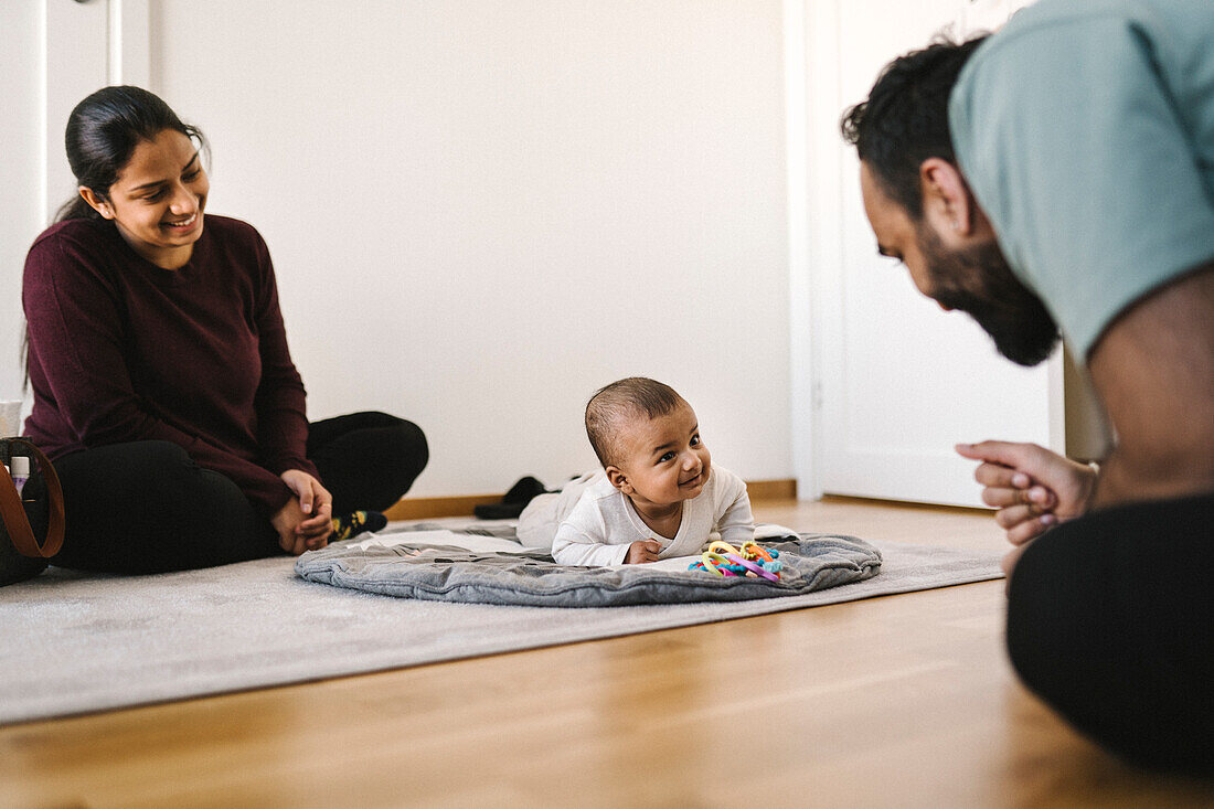 Father and mother with baby