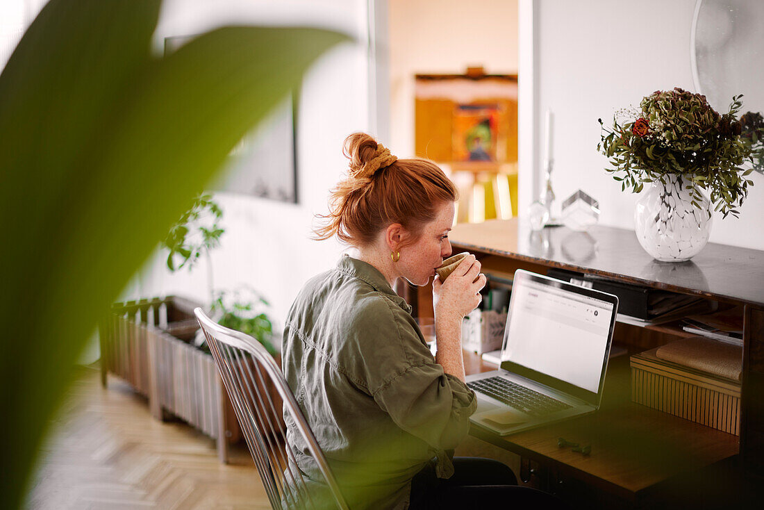 Woman using laptop