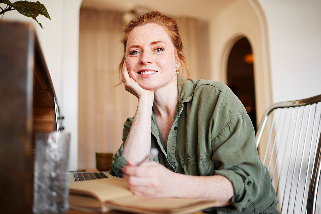 Smiling woman looking at camera