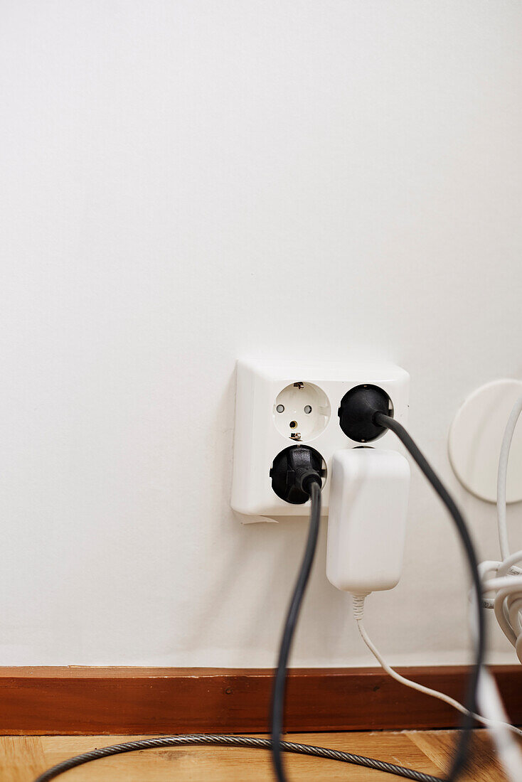 Wall socket with plugs