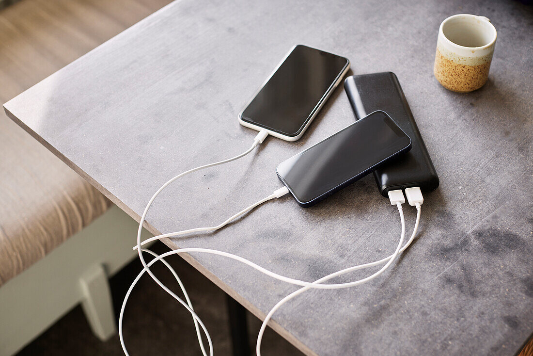 Cell phones connected to power bank