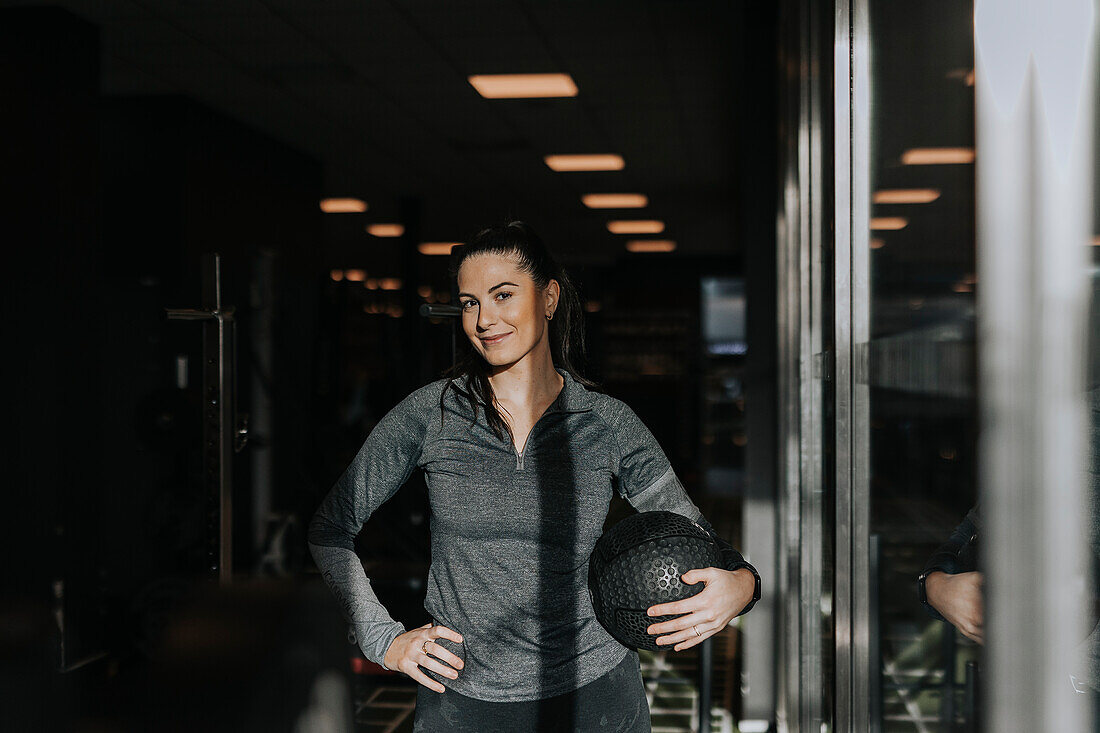 Woman standing in gym