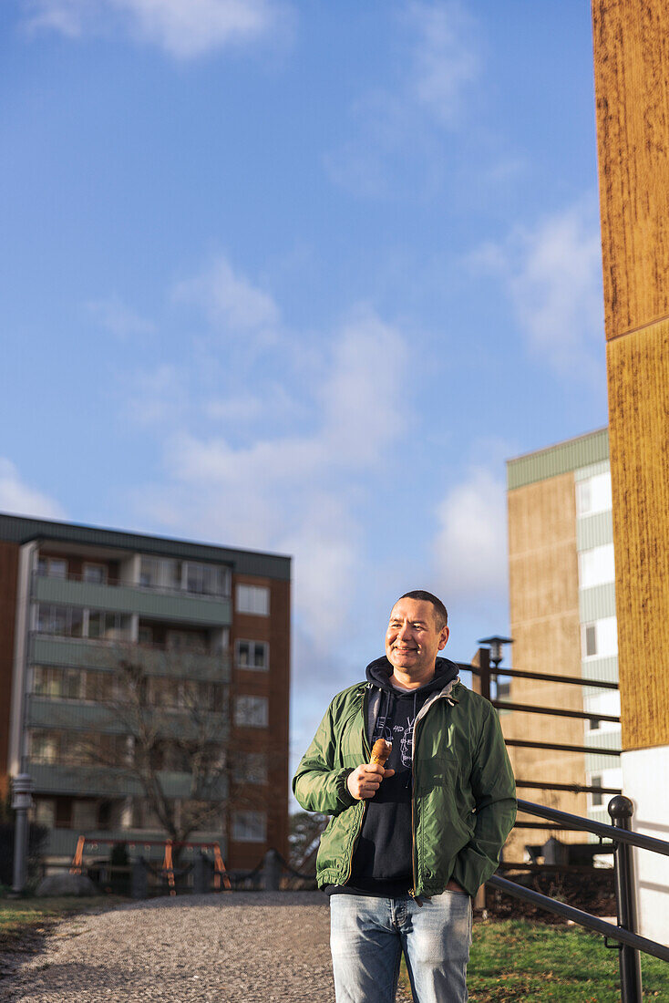 Mature man holding ice-cream