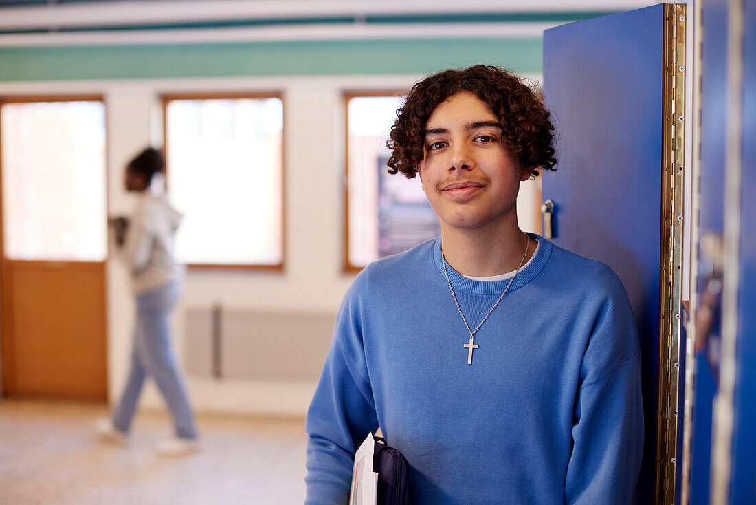 Teenage boy looking at camera