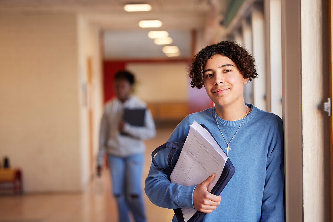 Teenage boy looking at camera