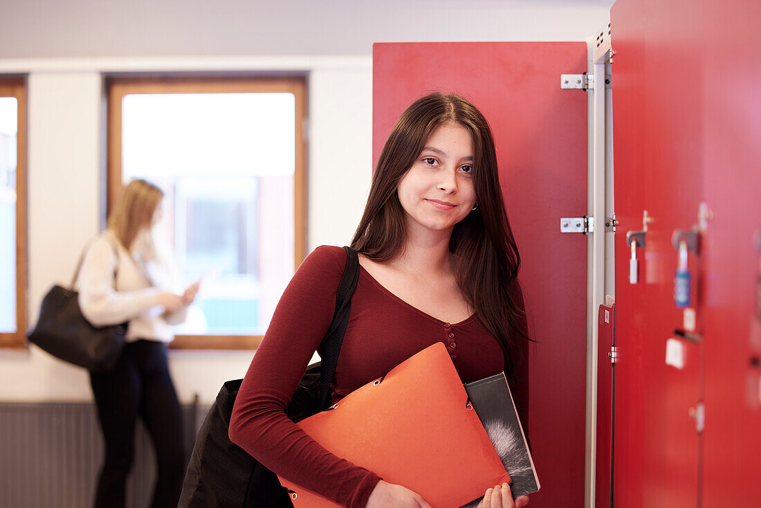 Teenage girl looking at camera