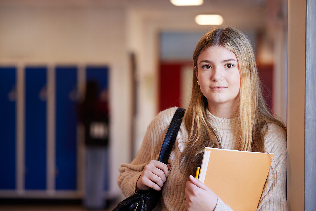 Teenage girl looking at camera