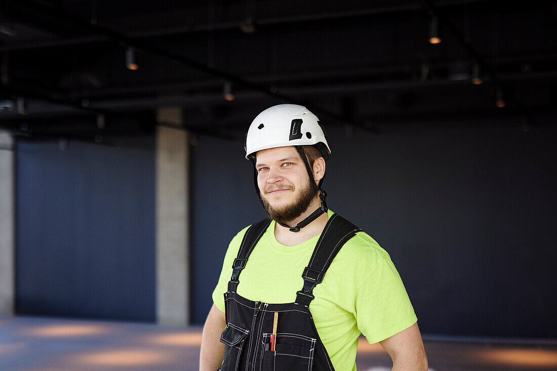 Smiling worker looking at camera