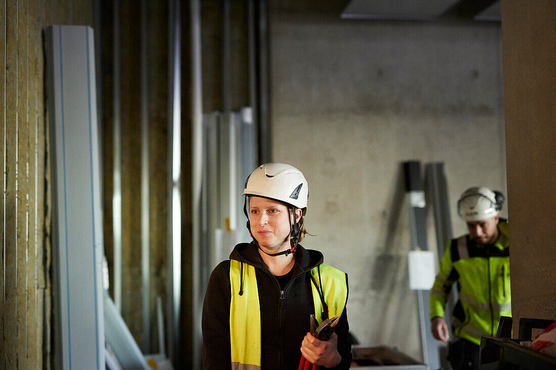 Female worker at building site
