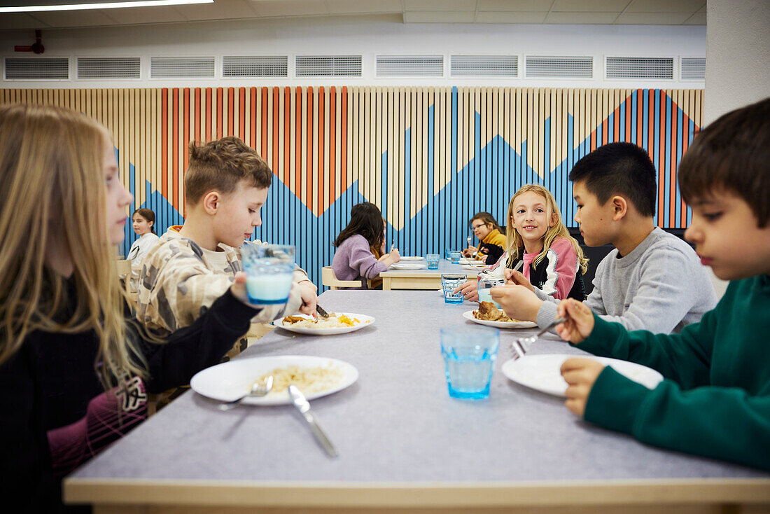 Children having lunch in cafeteria