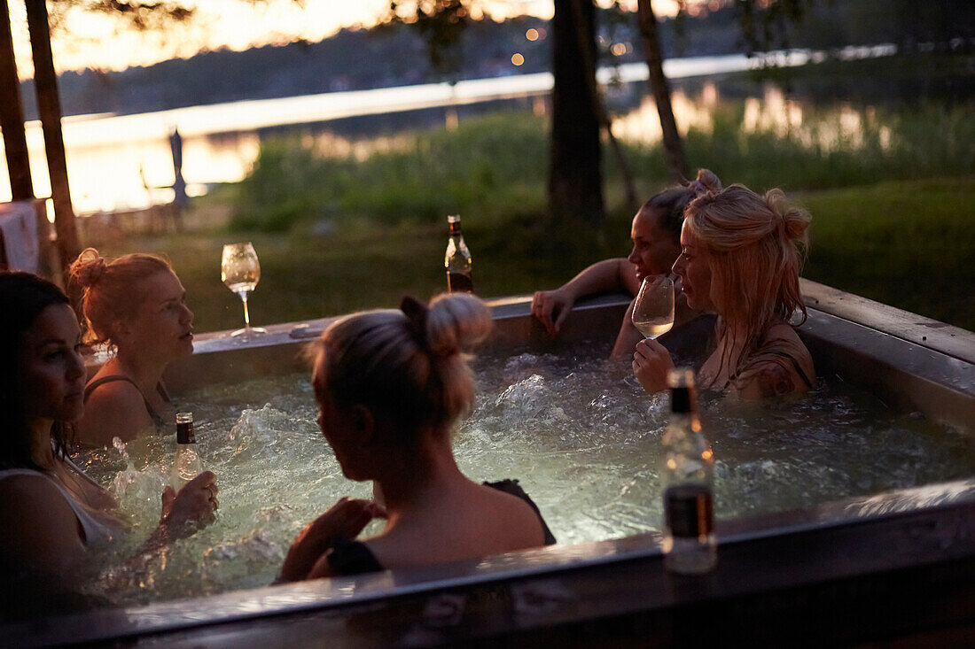 Female friends relaxing in hot tub