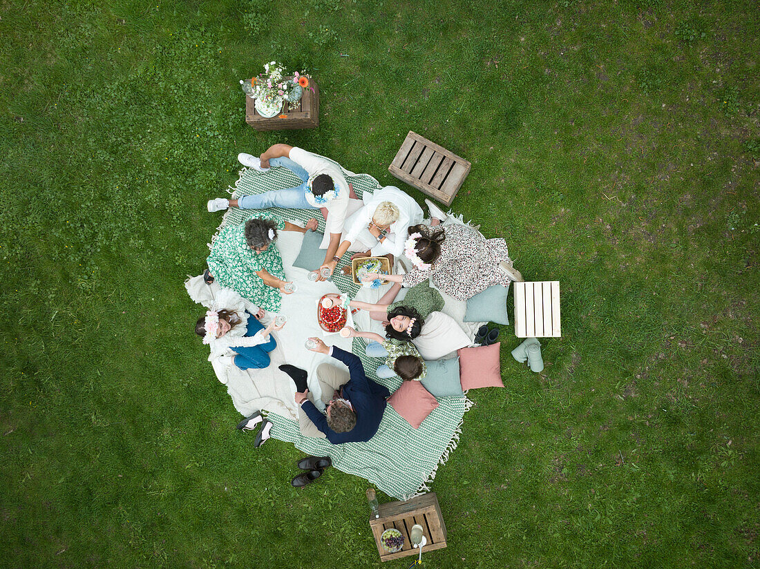Family having midsummer picnic