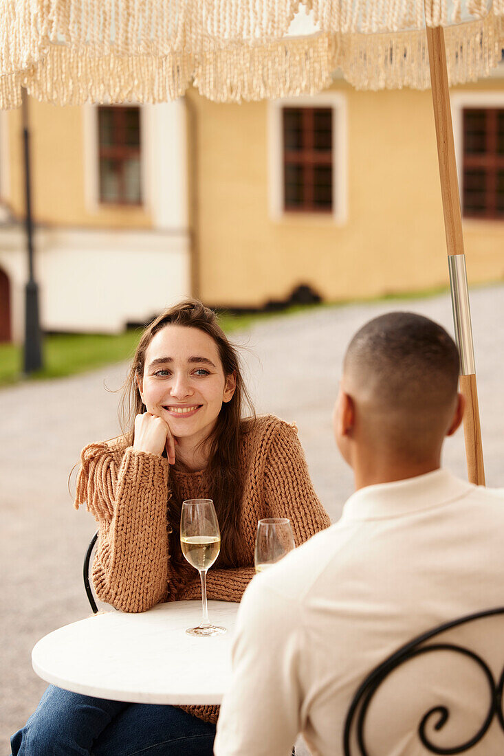 Couple celebrating on patio