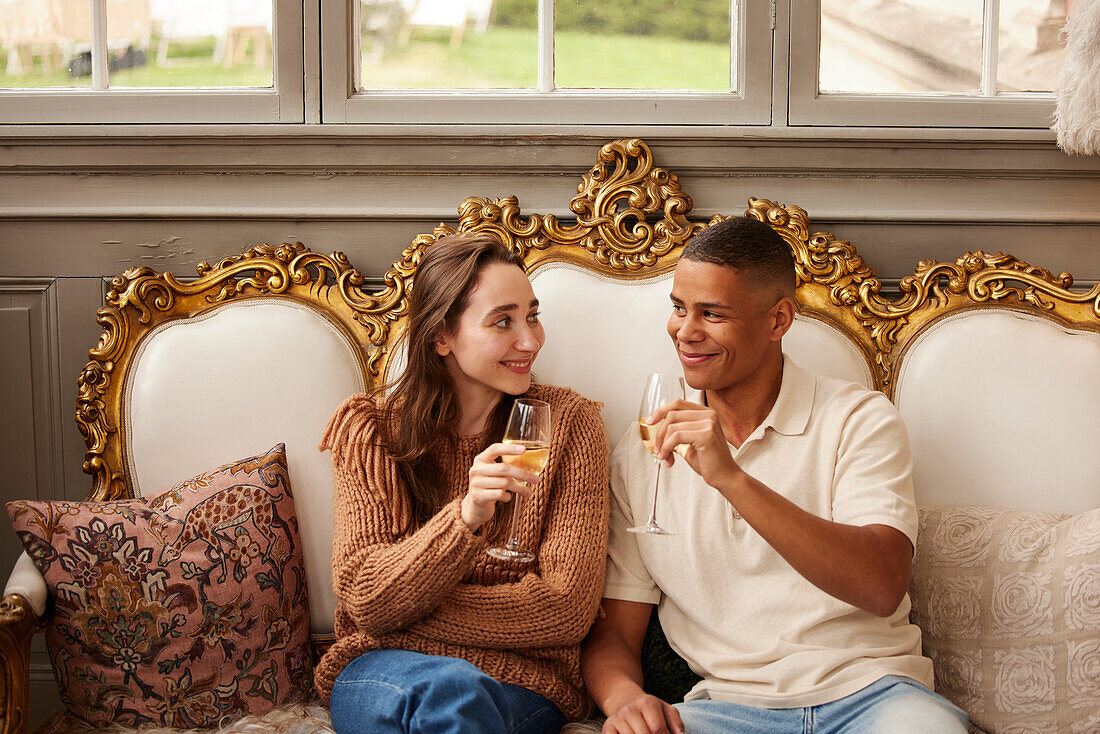 Couple celebrating in luxury house