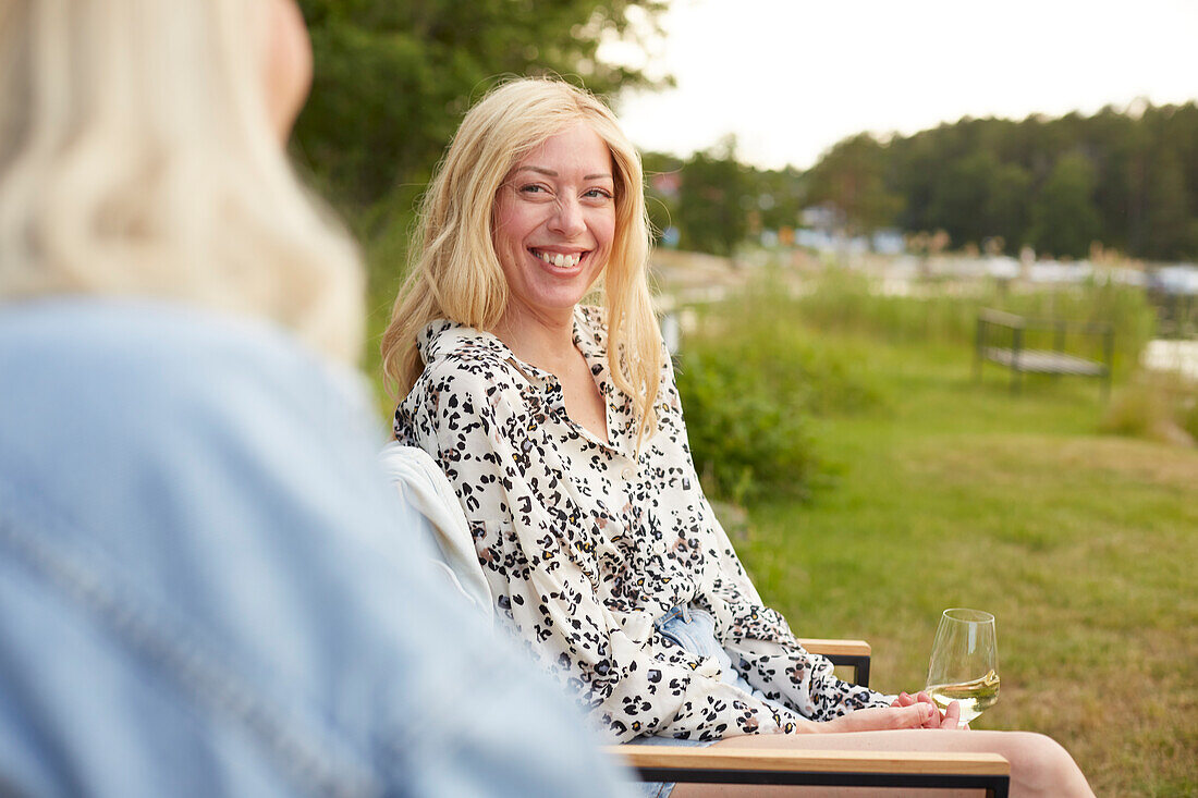 Smiling woman relaxing outdoor