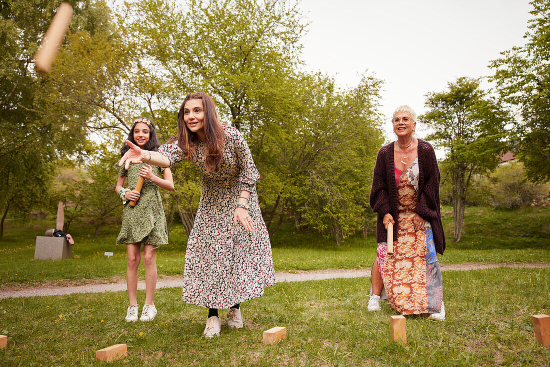 People playing molkky outdoors