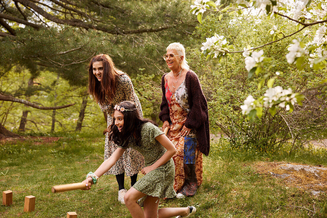 People playing molkky outdoors