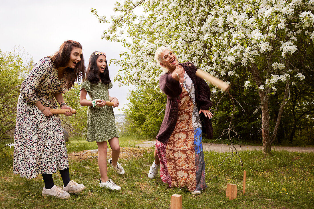 People playing molkky outdoors