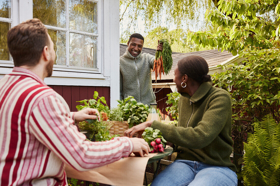 Friends sitting in garden