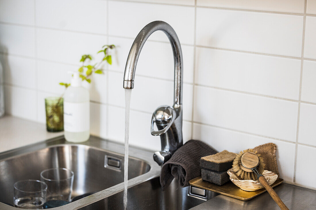 Water running in kitchen sink