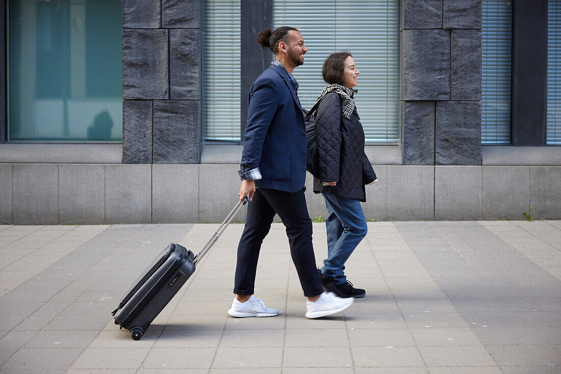 Smiling couple walking together