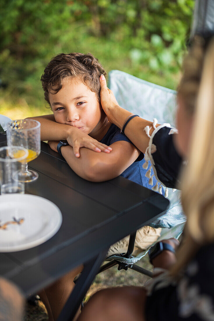 Boy sitting at table