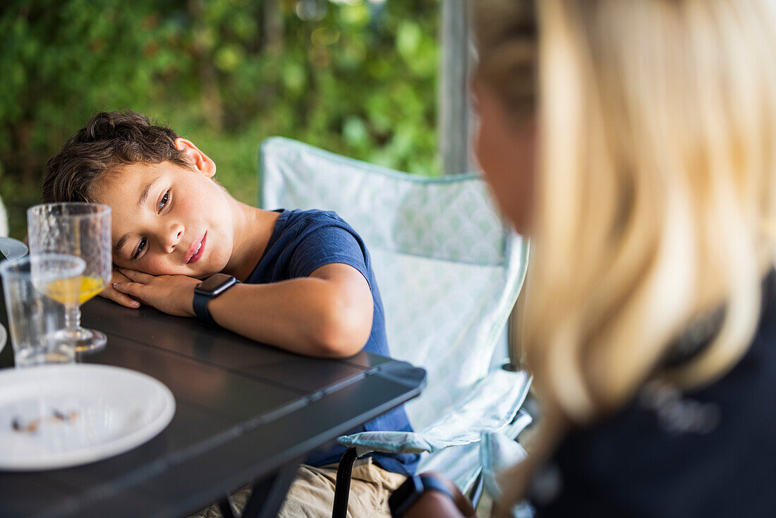 Boy sitting at table