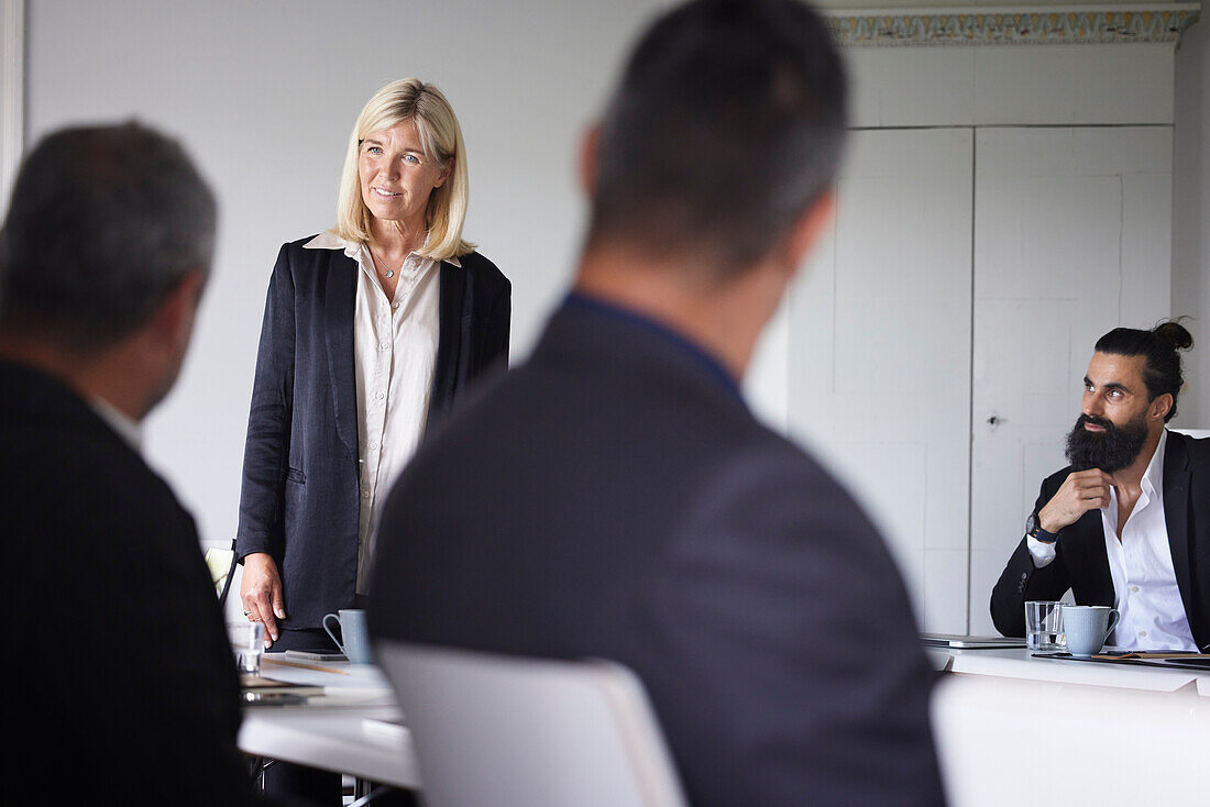 Smiling businesswoman at meeting